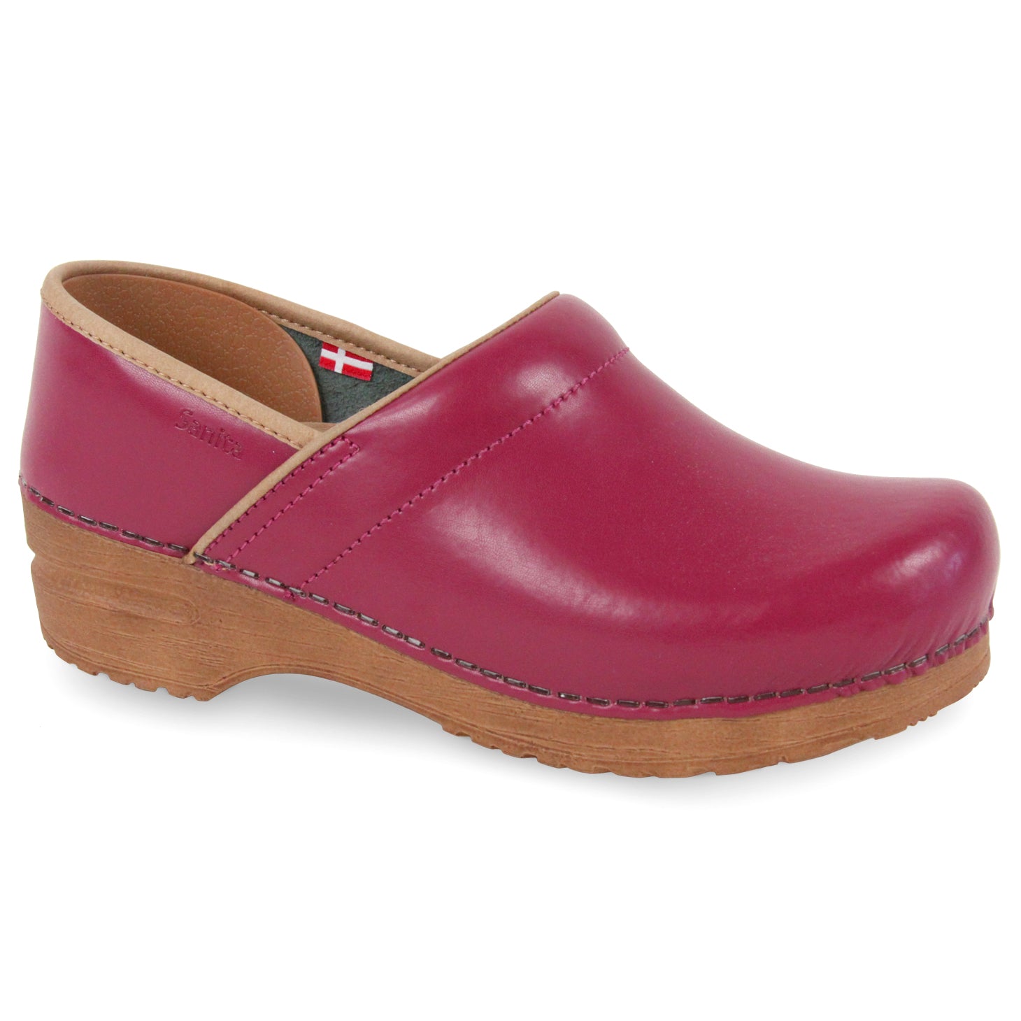 Raspberry colored clog shoe on white background